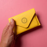 Leather Envelope RFID Wallet in yellow, showing logo placement