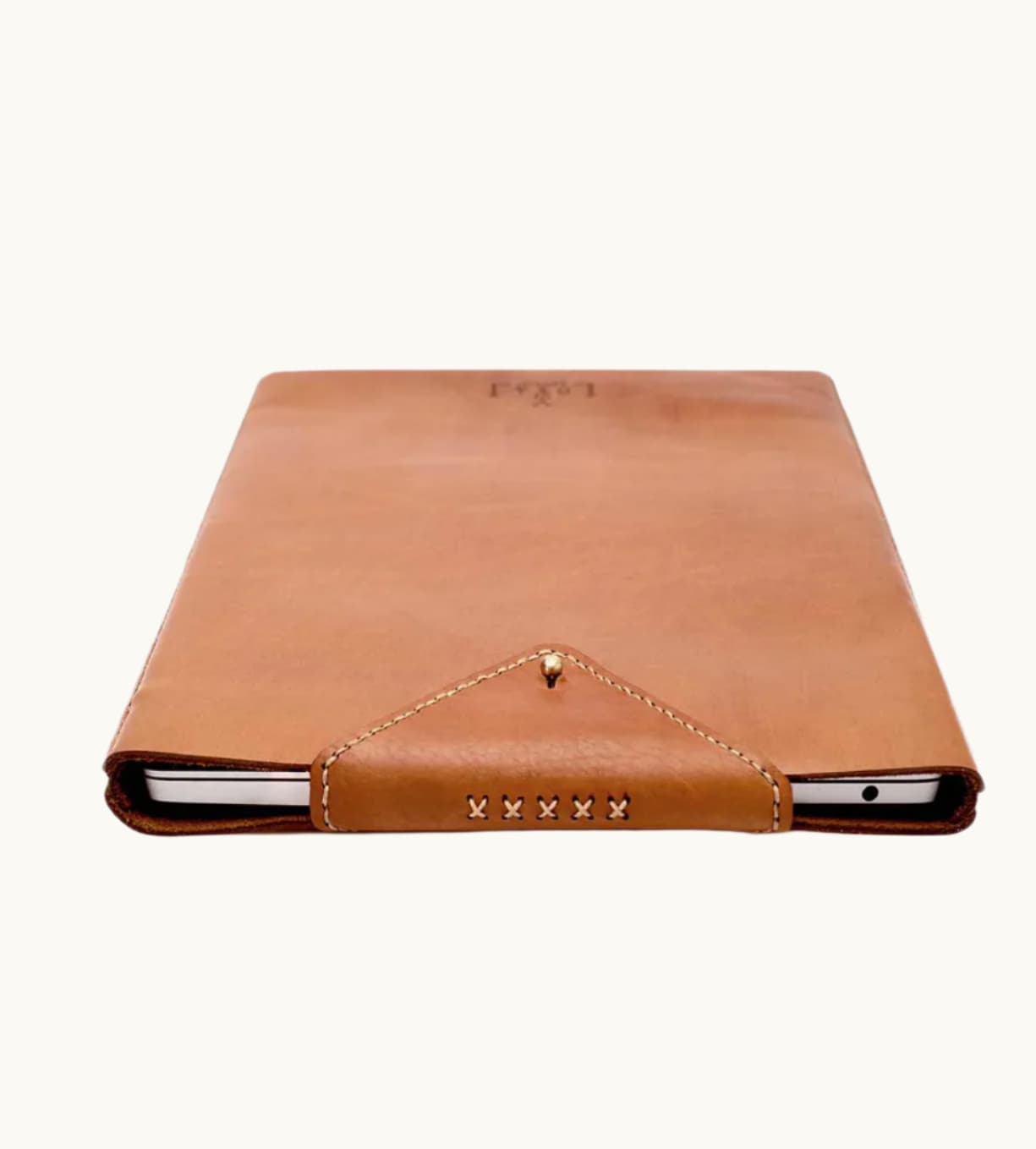 Hand-Stitched Leather Laptop Sleeve in cognac showing harness post closure and unlined interior, luxury corporate gift