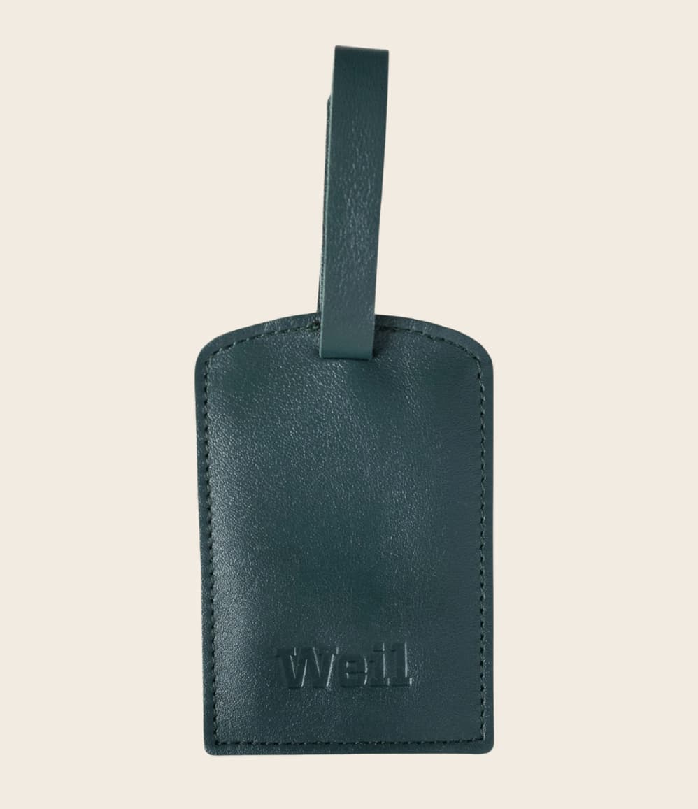 Leather Luggage Tag in green, personalised with Weil logo embossed