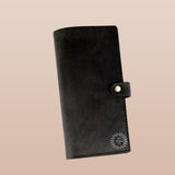 Black leather passport holder, a personalised  eco conference gift