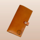 Brown vegan leather passport holder for executives corporate gifts.