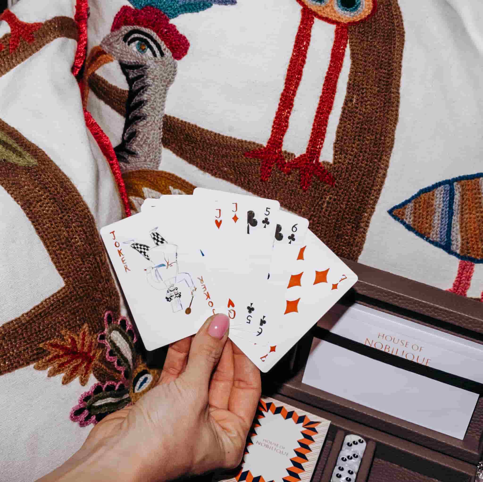 Taupe leather playing cards set, a premium corporate gift for executive teams and brand activations.