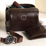 Leather Toiletry Bag in brown, showing logo placement