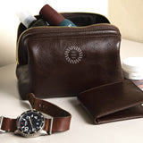 Leather Toiletry Bag in brown, showing logo placement