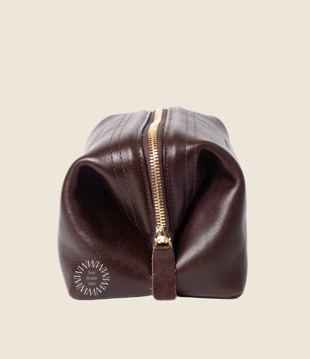 Leather Toiletry Bag in black, side view, zip closed