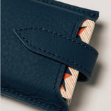 Blue leather travel playing cards set with magnetic closure, a personalised corporate gift from women-owned brands.