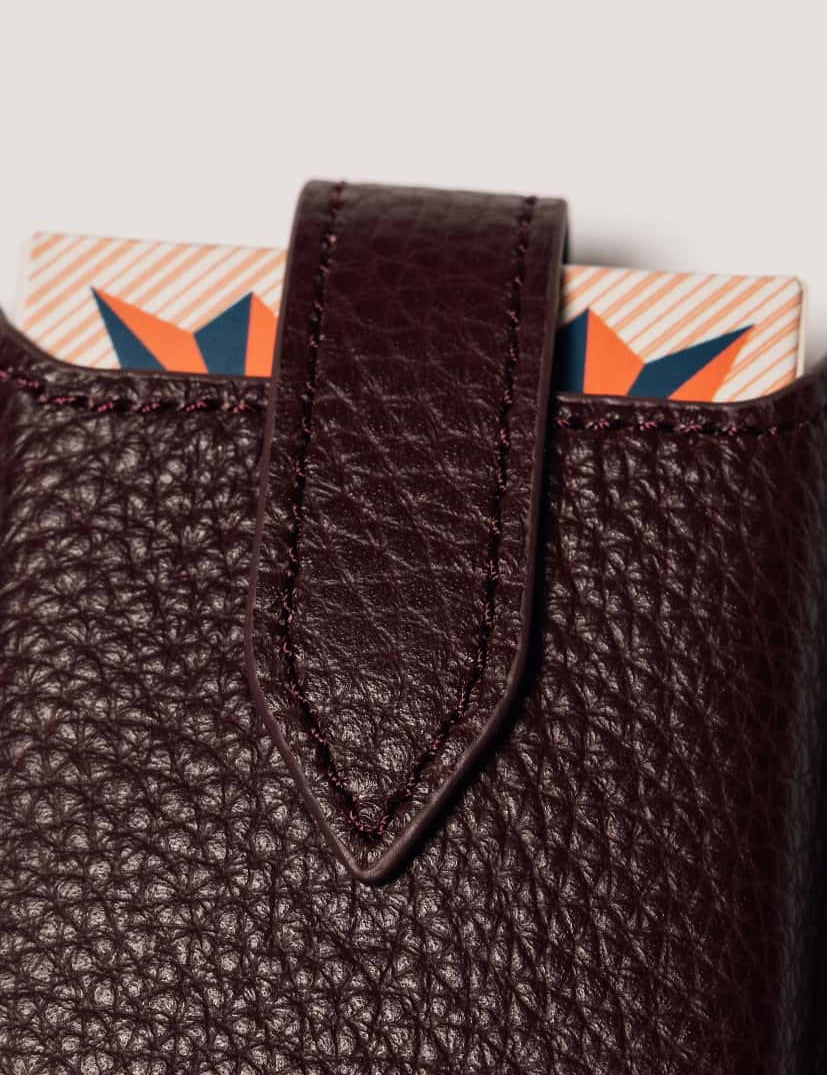 Burgundy leather travel playing cards set, a premium corporate gift for executive teams and brand activations.