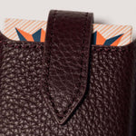 Burgundy leather travel playing cards set, a premium corporate gift for executive teams and brand activations.