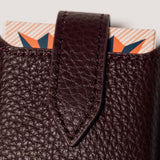 Burgundy leather travel playing cards set, a premium corporate gift for executive teams and brand activations.