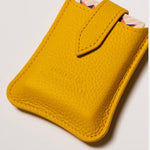 Yellow leather travel playing cards set, a sustainable corporate gift with cards, dice and notebook for VIP client gifting and brand activations.