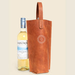 Leather Wine Carrier in tan, showing logo placement