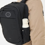 Lightweight Water Resistant Backpack 12L in black, worn on the back, showing logo placement