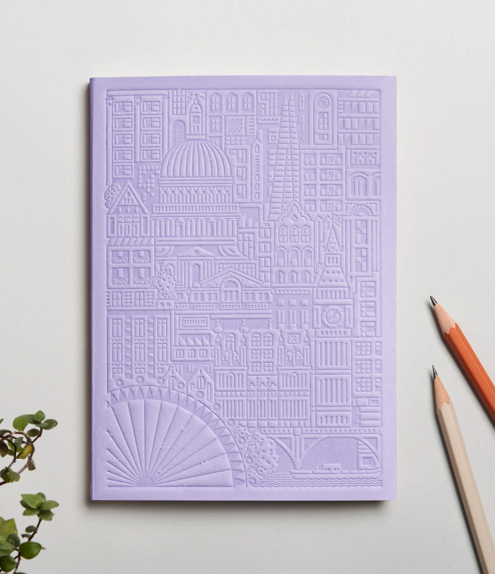 Debossed London notebook in lavender, sustainable corporate stationery. Premium personalised corporate gifting for executive meetings.