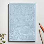 Debossed City of London notebook in sky blue. Sustainable Eco swag for events. Premium corporate gifts for women.