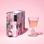 Luberon Rosé 2025, the box shown alongside a glass, showing the paint-palette-inspired design