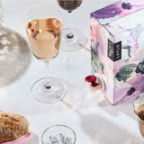 Luberon Rosé 2025, boxed on a table with glasses of rosé poured alongside