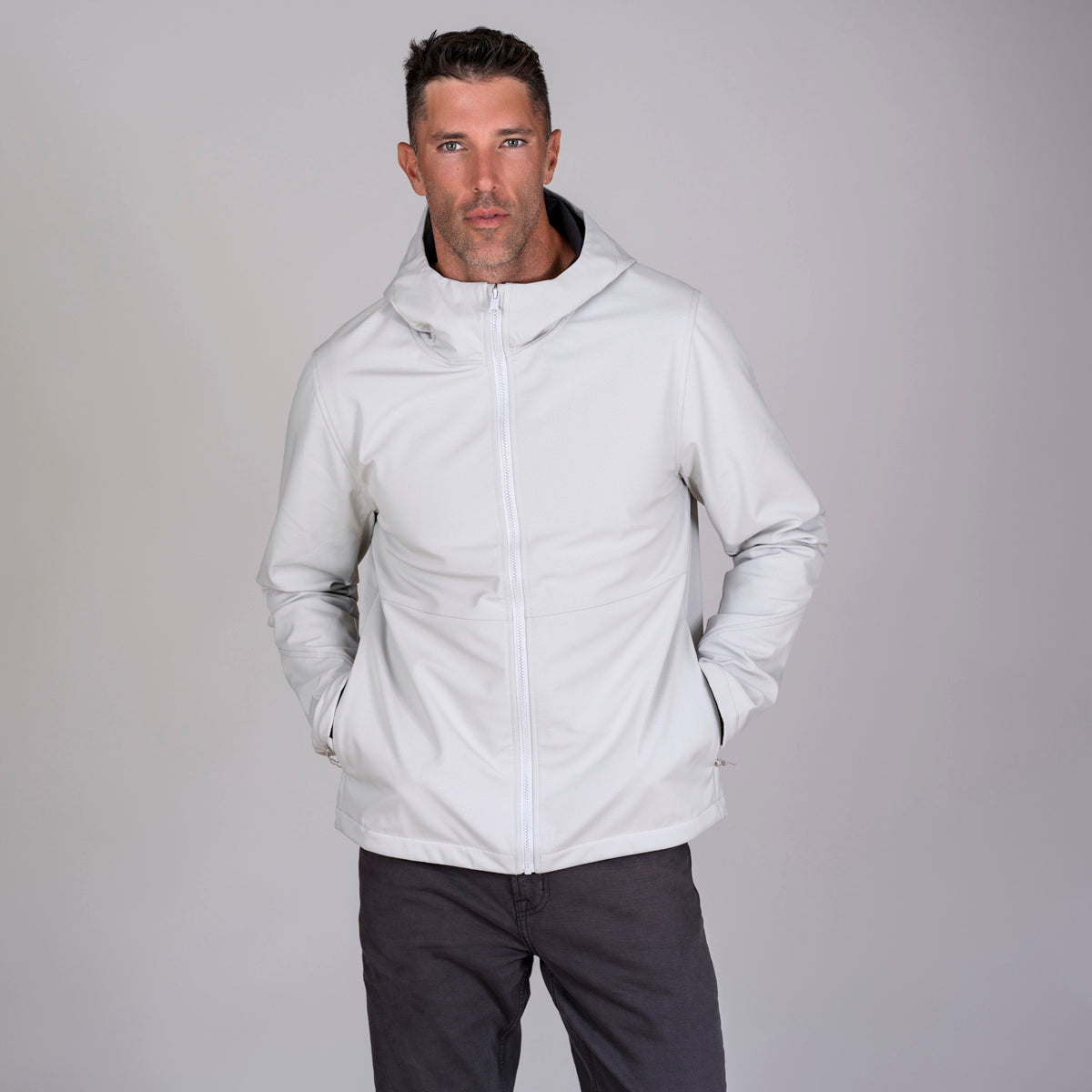 Men's soft shell hoodie front view in white. Eco branded company swag for giveaways and corporate gifting.