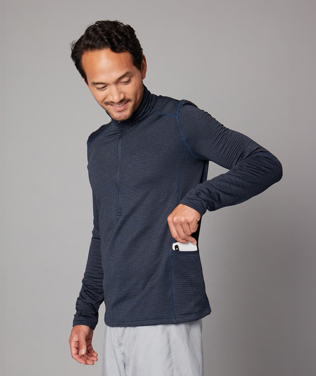 Men's Zip Neck Jumper in blue, worn