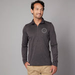 Men's Zip Neck Jumper in charcoal taupe, worn showing logo placement.