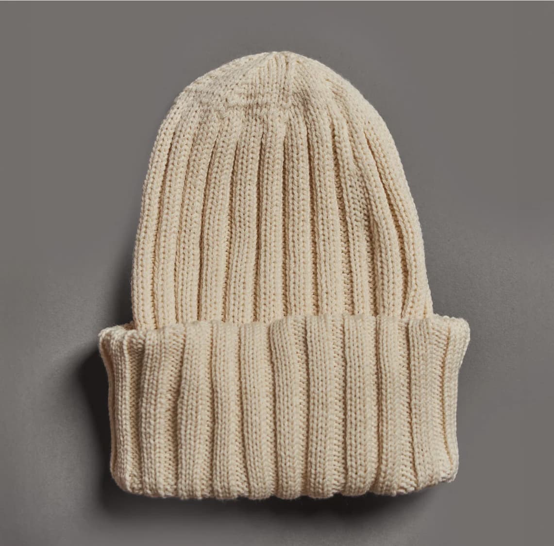 Beige merino wool beanie made from ethically sourced wool, premium sustainable corporate gifts for clients and employees