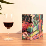 Merlot 2024, showing the Matisse-inspired box design alongside a glass of wine