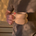 Beige Michelin-style ceramic mug with rounded shape, sustainable corporate gifts for clients and employees 
