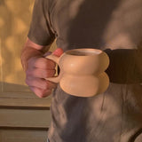 Beige Michelin-style ceramic mug with rounded shape, sustainable corporate gifts for clients and employees 