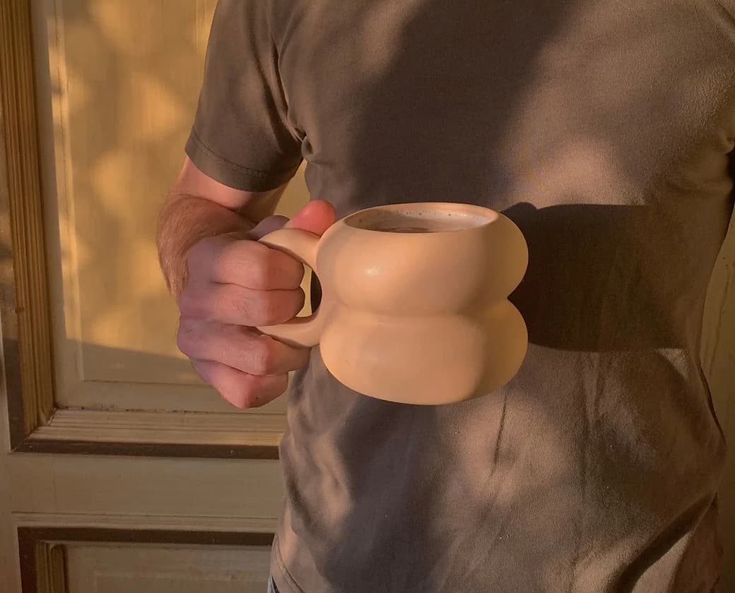 Beige Michelin-style ceramic mug with rounded shape, sustainable corporate gifts for clients and employees 