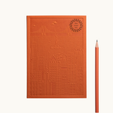 Debossed New York notebook in orange, eco swag for events
