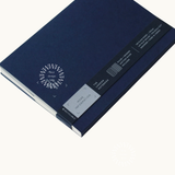 Back of blue notebook showing logo placement.
