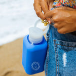 Reusable Glass Bottle 500ml in blue, showing logo placement