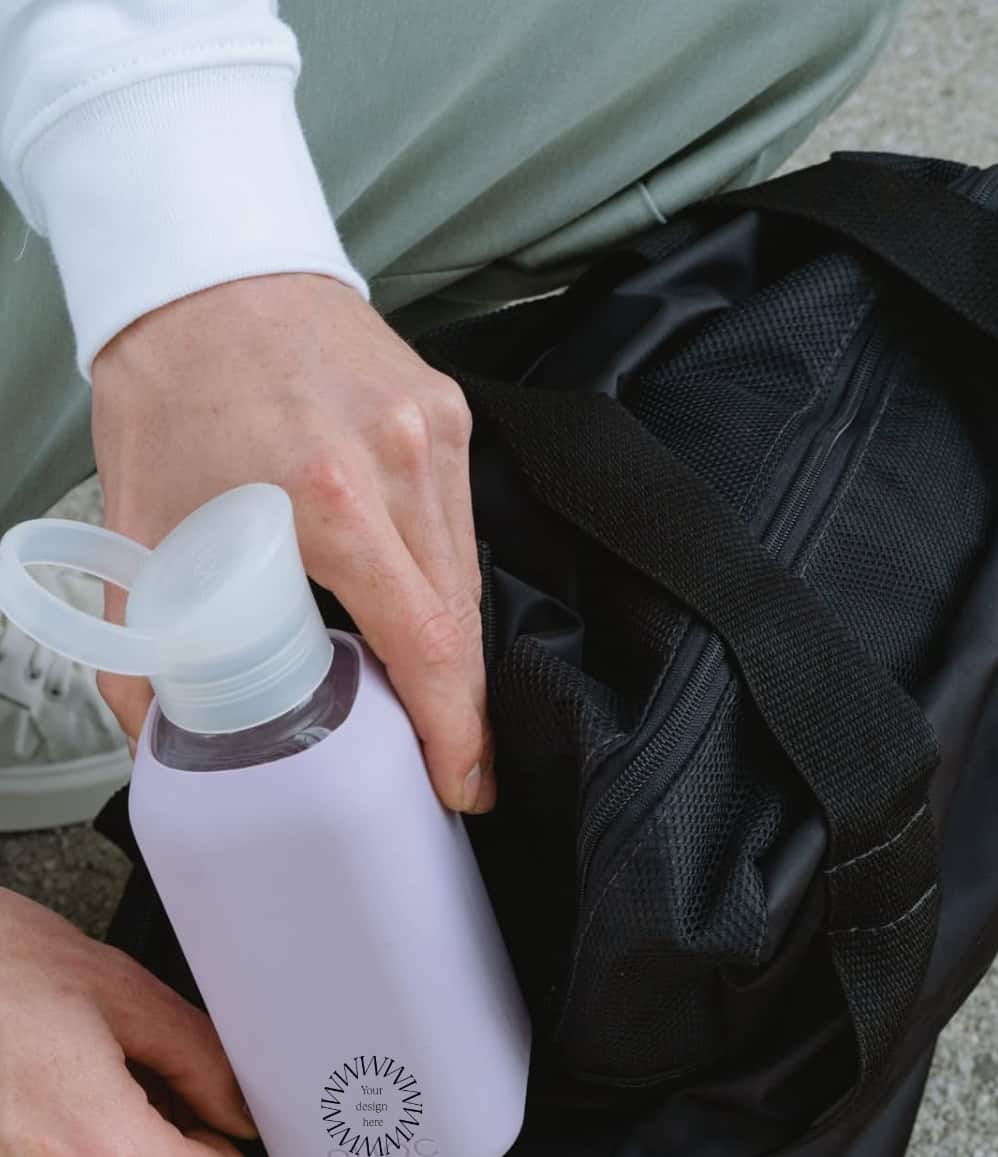 Reusable Glass Bottle 500ml in lavender, showing logo placement