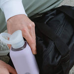 Reusable Glass Bottle 500ml in lavender, showing logo placement