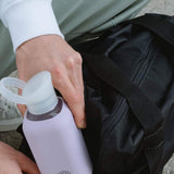 Reusable Glass Bottle 500ml in lavender, showing logo placement