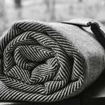 Handcrafted herringbone organic cotton throw, executive corporate gift from female artisans in Argentina