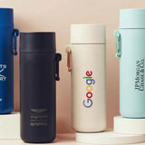 Plant Based Water Bottle, four bottles personalised with different company logos and brand colours