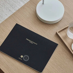 Productivity Daily Desk Pad for tracking goals, habits and wellbeing, sustainable wellness gift for employees and clients.