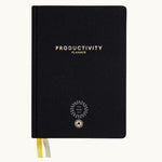Productivity Planner, front cover in black, showing logo placement