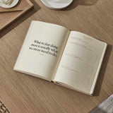 Productivity Planner, inside page reading "What we fear doing most is usually what we most need to do"