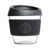 Black reusable glass coffee cup with thermal sleeve, co-branded for premium merch