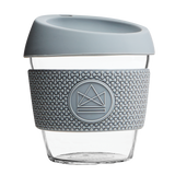 Grey reusable glass coffee cup with thermal sleeve, co-branded for premium merch.
