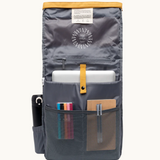 Vegan roll-top backpack in mustard, inside view with multiple internal pockets in waterproof recycled canvas for organised gadget storage. Sustainable branded merch