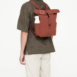 Roll-Top Mini Backpack 9L, worn, showing logo placement