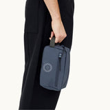 rPET Washbag in blue, being carried showing logo placement