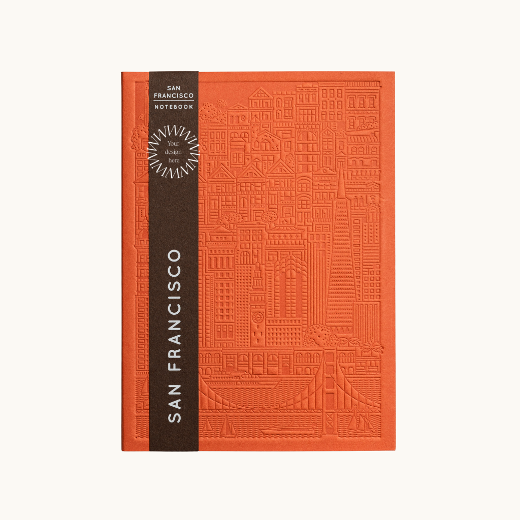Debossed San Francisco notebook in orange, sustainable event merchandise