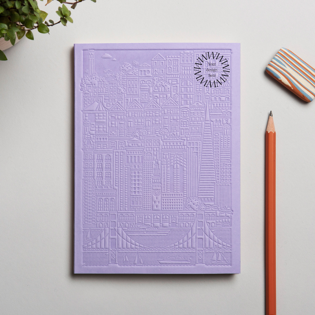 Debossed Stockholm notebook in lavender. Premium corporate gift from women-owned brands.