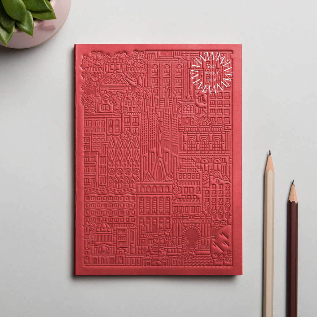 Debossed Stockholm notebook in red. Sustainable branded notebook from women-owned brands