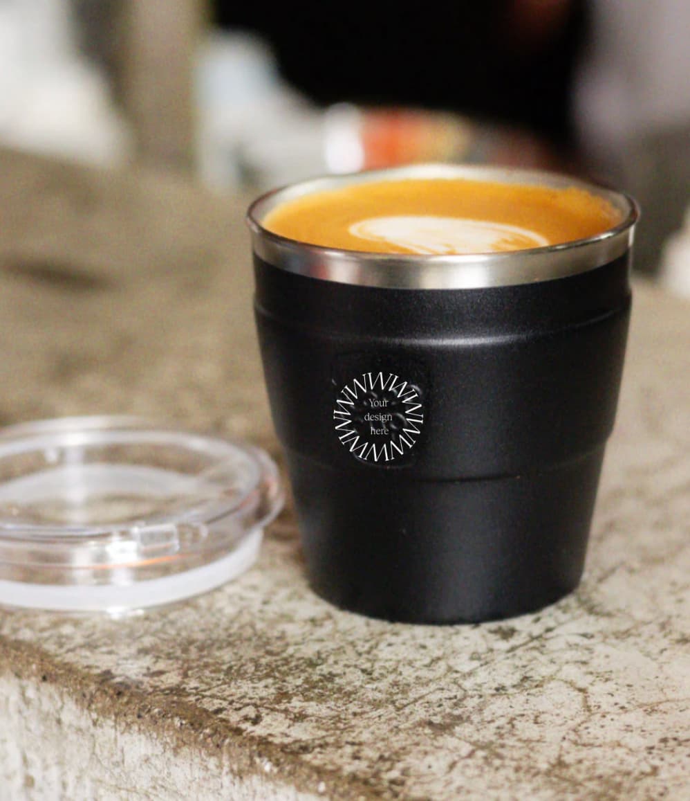 Thermal Travel Coffee Cup in black, showing logo placement