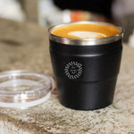 Thermal Travel Coffee Cup in black, showing logo placement