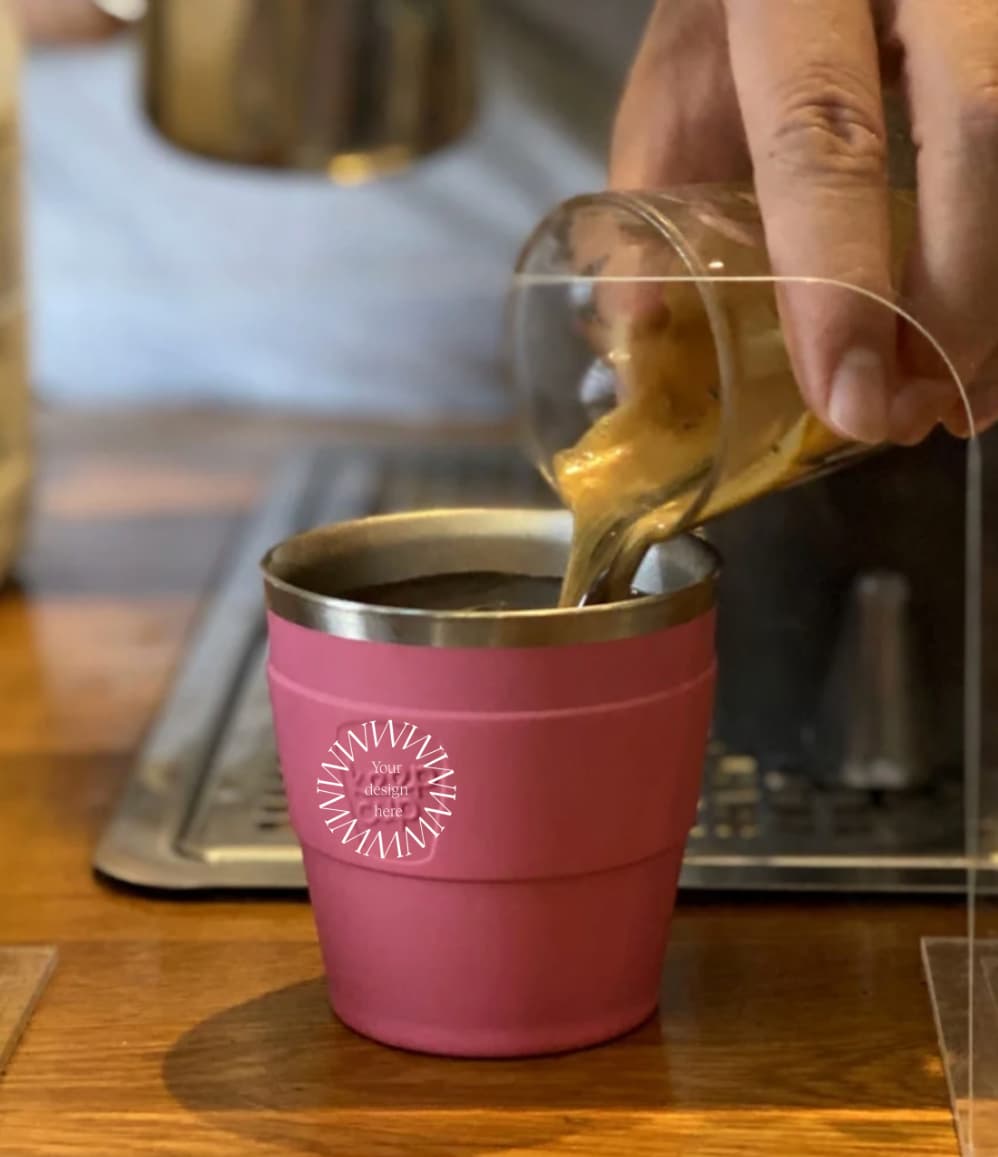 Thermal Travel Coffee Cup in blush pink, showing logo placement